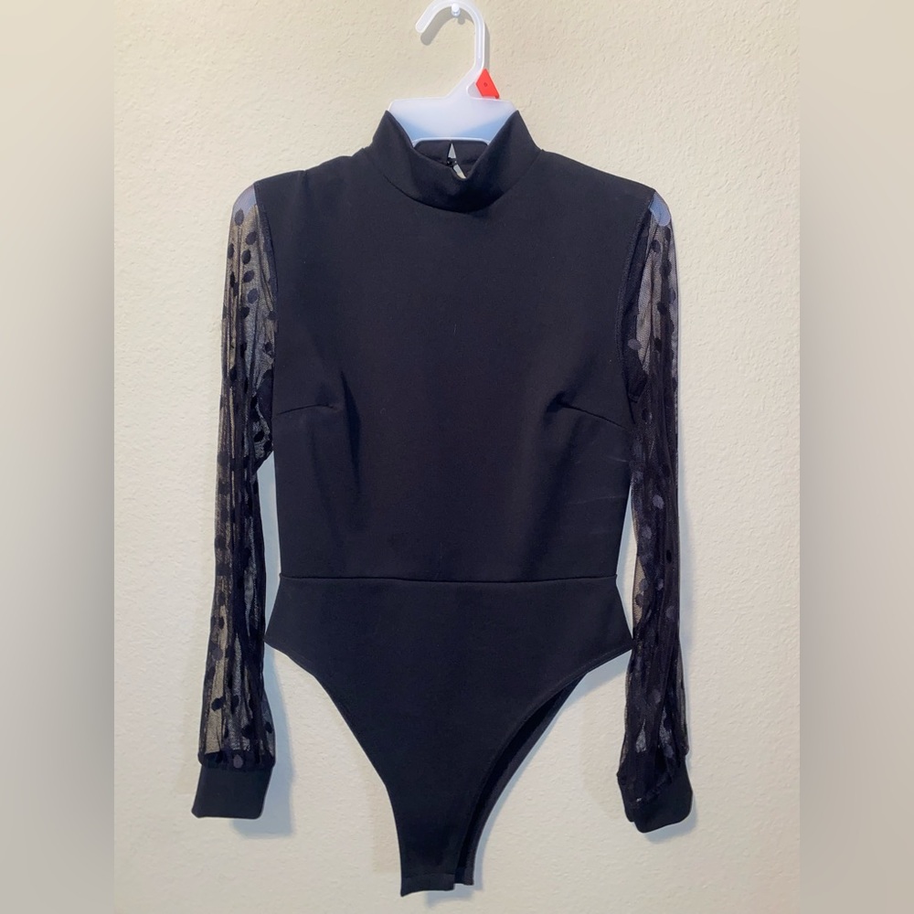 Black body suit with polka dot long sleeve